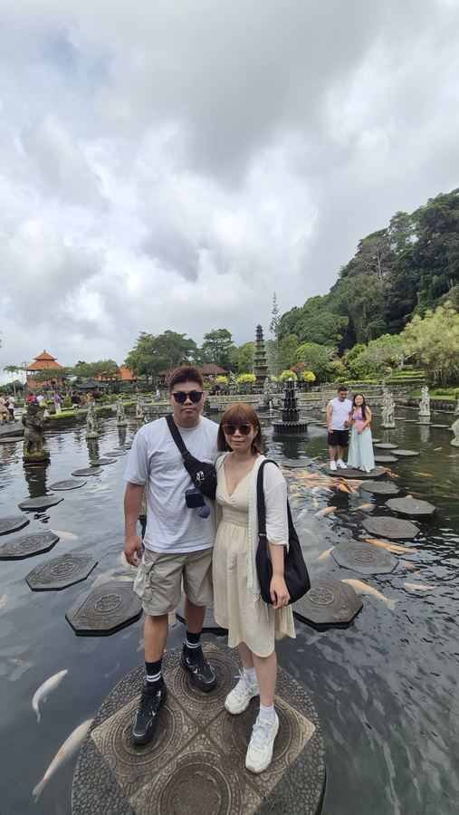 Guests on the stepping stones at Tirta Gangga